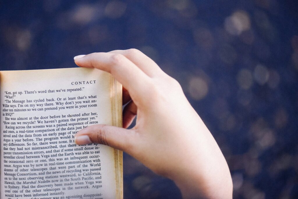 Hand holding a book